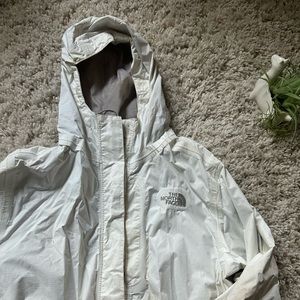 The north face lightly used white zip up lightweight women’s jacket. Siz…